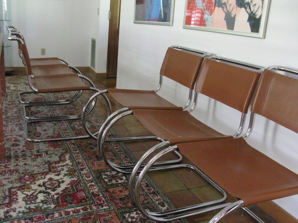 SET OF 6 ITALIAN LEATHER DINING CHAIRS AFTER KNOLL: Set of six Italian dining chairs of chromed metal frames with wrapped leather seats and back in the style of the MR chair designed for Knoll. each 32.5"h x 18.25"w with a 20" seat height. PROVENANCE: