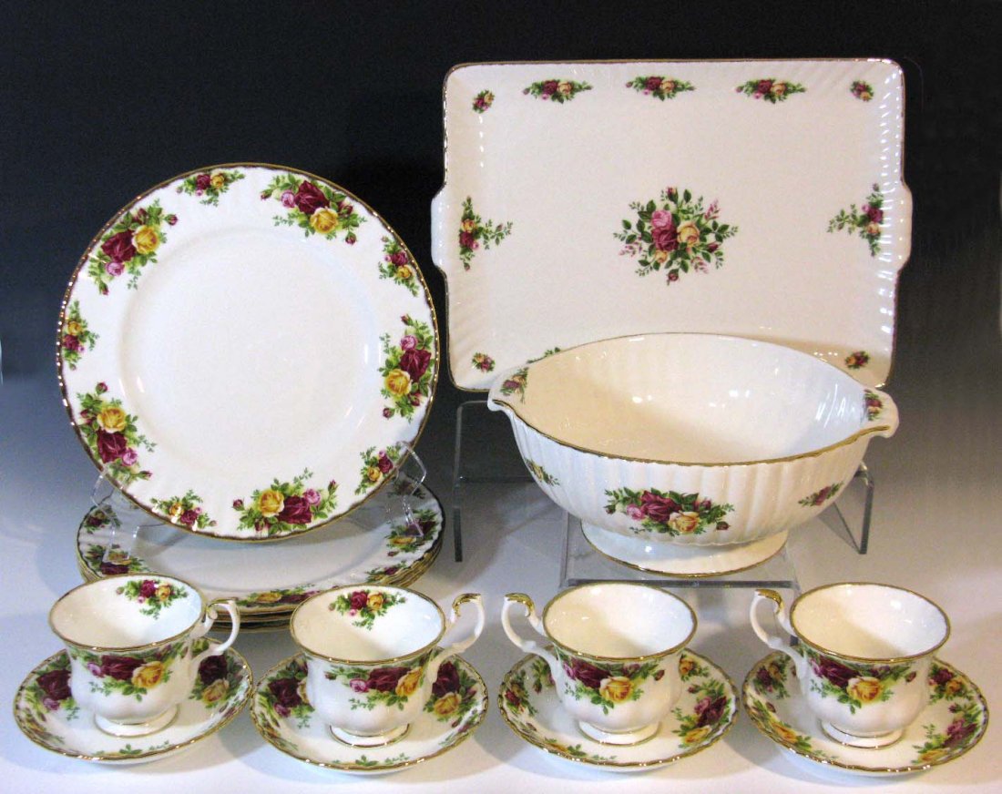 NIB ROYAL ALBERT OLD COUNTRY ROSES DINNER SERVICE: A Collection of Royal Albert Bone China Dinnerware Service with Serving Pieces in the Old Country Roses Pattern with a Gilded Rim. 1.) The 12pc service includes 4 @ Dinner Plates, 10"d, 4 @ Teacups an