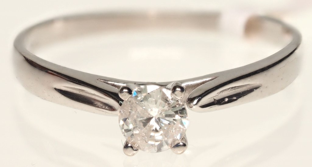 10K WHITE GOLD AND DIAMOND SOLITAIRE RING (1 of 3)
