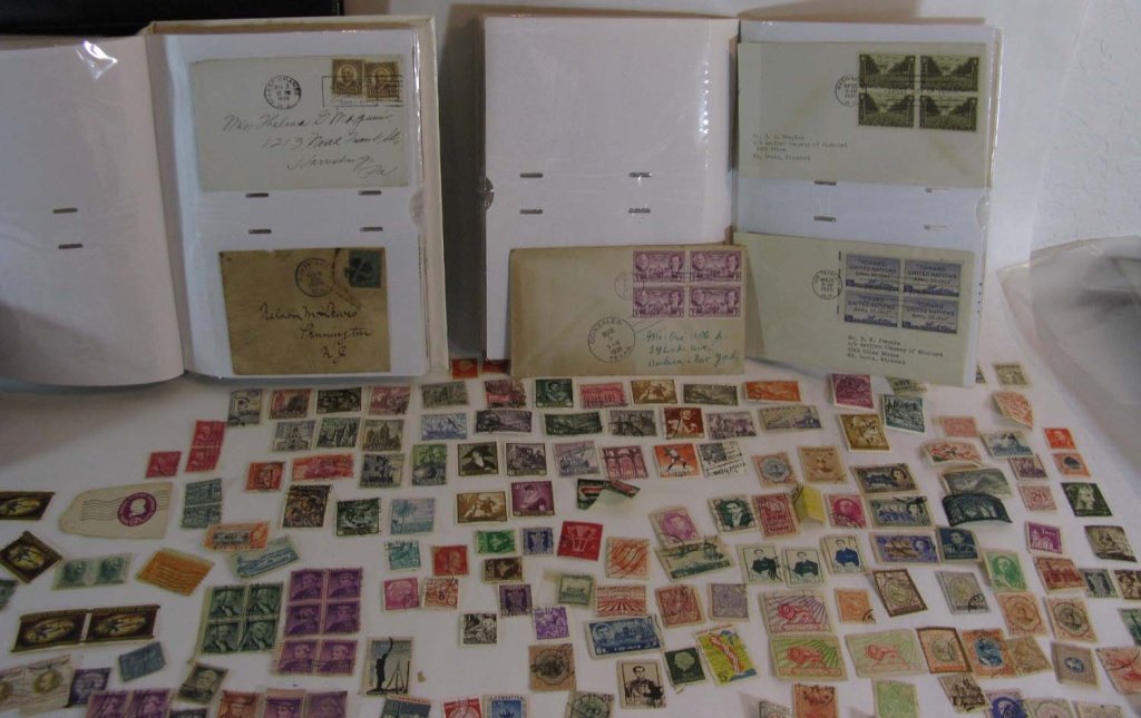 LIFETIME WORLD STAMP COLLECTION: Very large lot of antique and vintage, un-searched world stamps, this includes first day covers. Loose stamps contain stamps from America, Persia, Spain, Germany (including some with Hitler's likeness