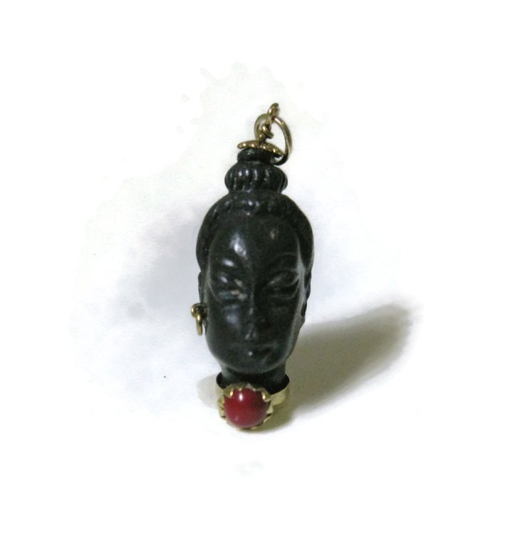ITALIAN BLACKAMOOR PENDANT WITH 18K GOLD: Depicting the bust of an elegant lady which is adorned with 18k yellow gold fittings and a gemstone choker necklace. 1"h