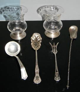 COLLECTION STERLING SILVER SERVING UTENSILS: 1.) Cocktail spoon with long, twisted handle terminating with an arrow, by Mechanics' Sterling Co., (a branch of Watson, Newell Co., North Attleboro, Mass.), 8.5"l. 2.) Pickle Fork, Whiting & Davis, 4