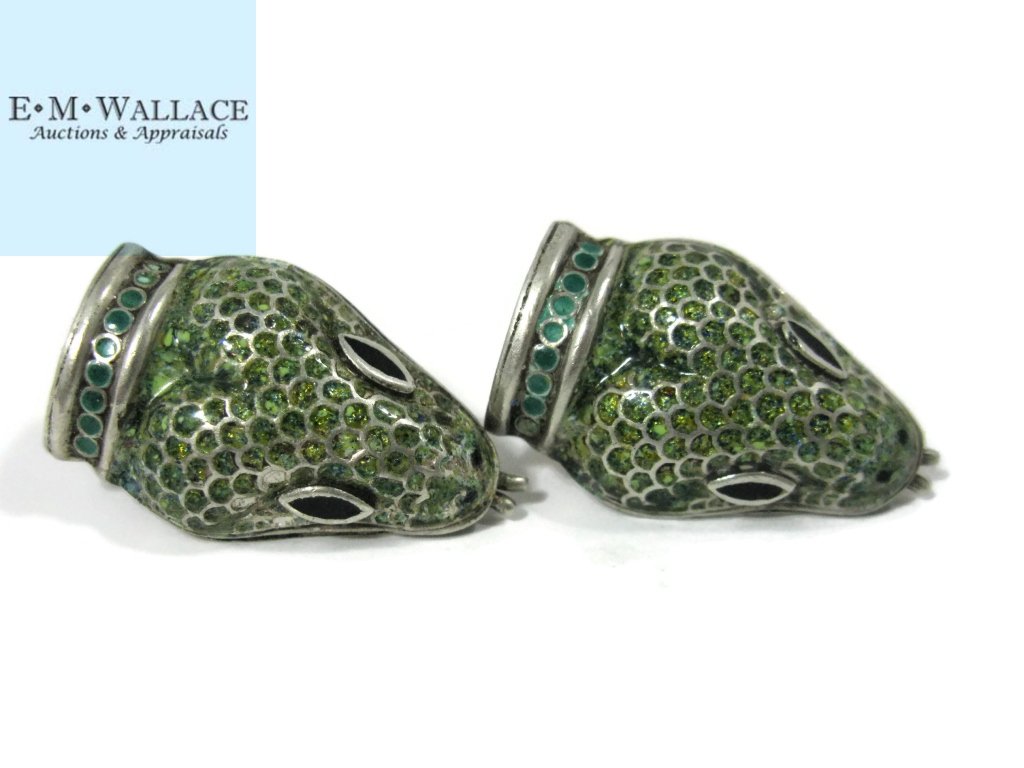 TAXCO MEXICO EARRINGS BY JAMIE QUIROZ: TAXCO MEXICO EARRINGS BY JAMIE QUIROZ: Pair of Snake Head screw-back earrings in sterling silver with onyx inlaid eyes and a body of glittery green champleve enamel with a bright green enamel collar.