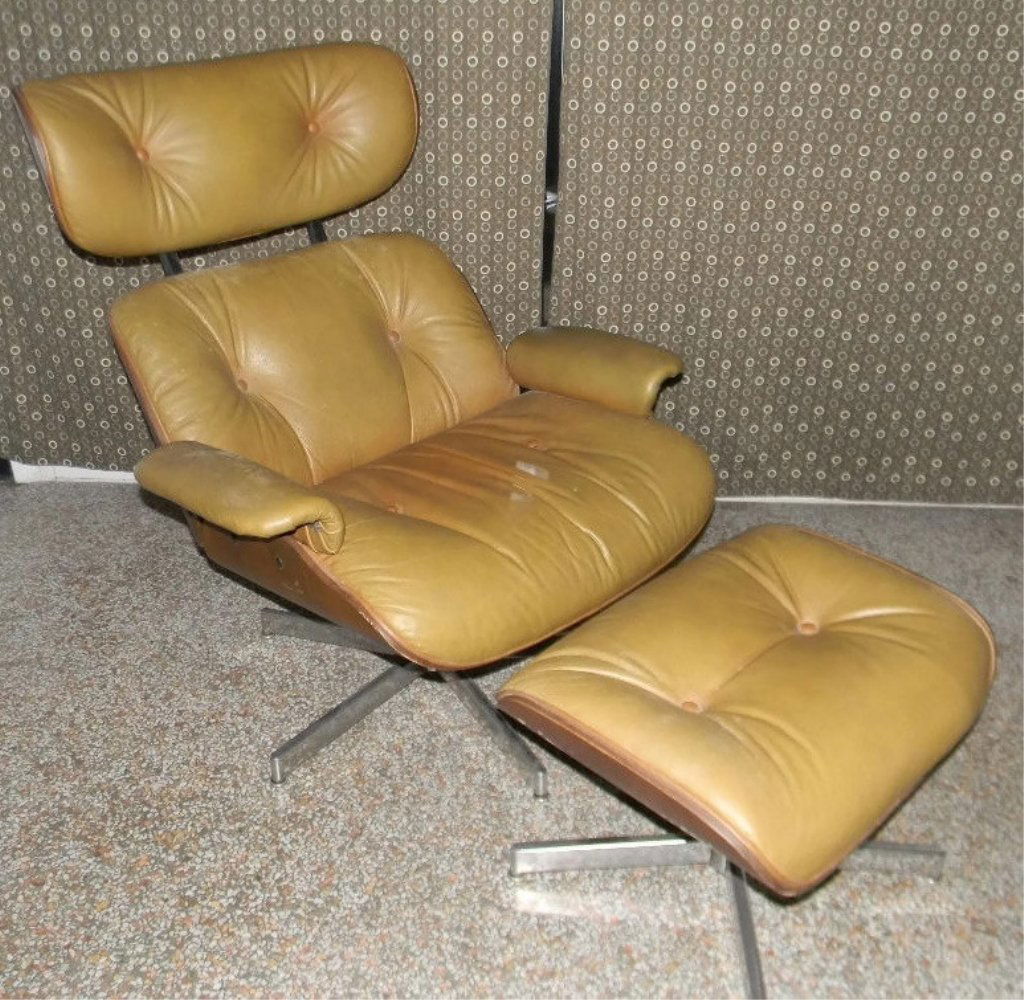 SELIG TAN MOLDED PLYWOOD LOUNGE CHAIR & OTTOMAN: SELIG LOUNGE CHAR & OTTOMAN: Danish design, Selig, mid-20th c. Molded Plywood Lounge Chair & Ottoman, In the style of Eames 670/671 lounge chair, tan faux leather and molded plywood back on a steel fr