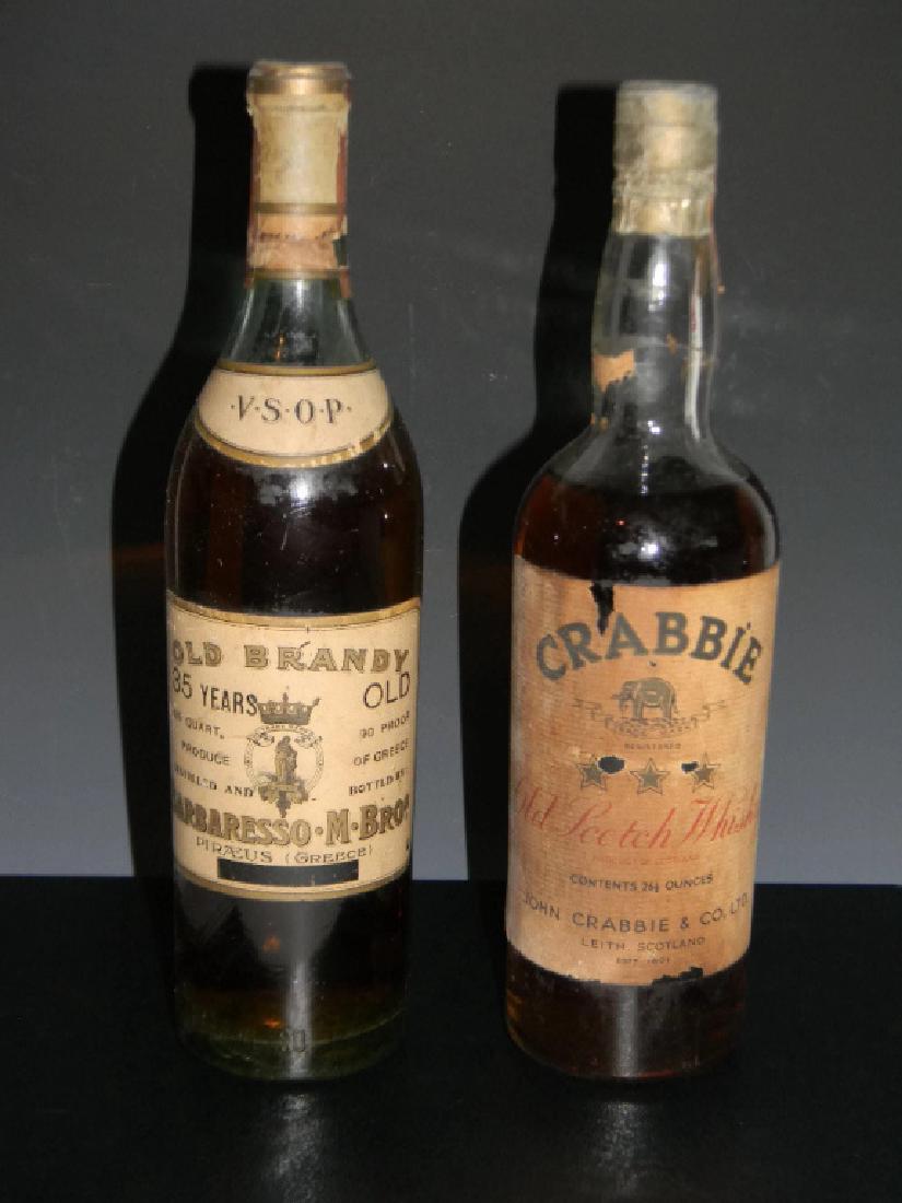 CRABBIE OLD SCOTCH WHISKEY & 35YR GREEK BRANDY: CRABBIE OLD SCOTCH WHISKEY & 35YR GREEK BRANDY: 1.) c. 1930s - A bottle of 3 star Blended Scotch Whisky from John Crabbie & Co. Founded in 1801, they were based in Leith. 2.) c. 1925 - VSOP 'Old Brand