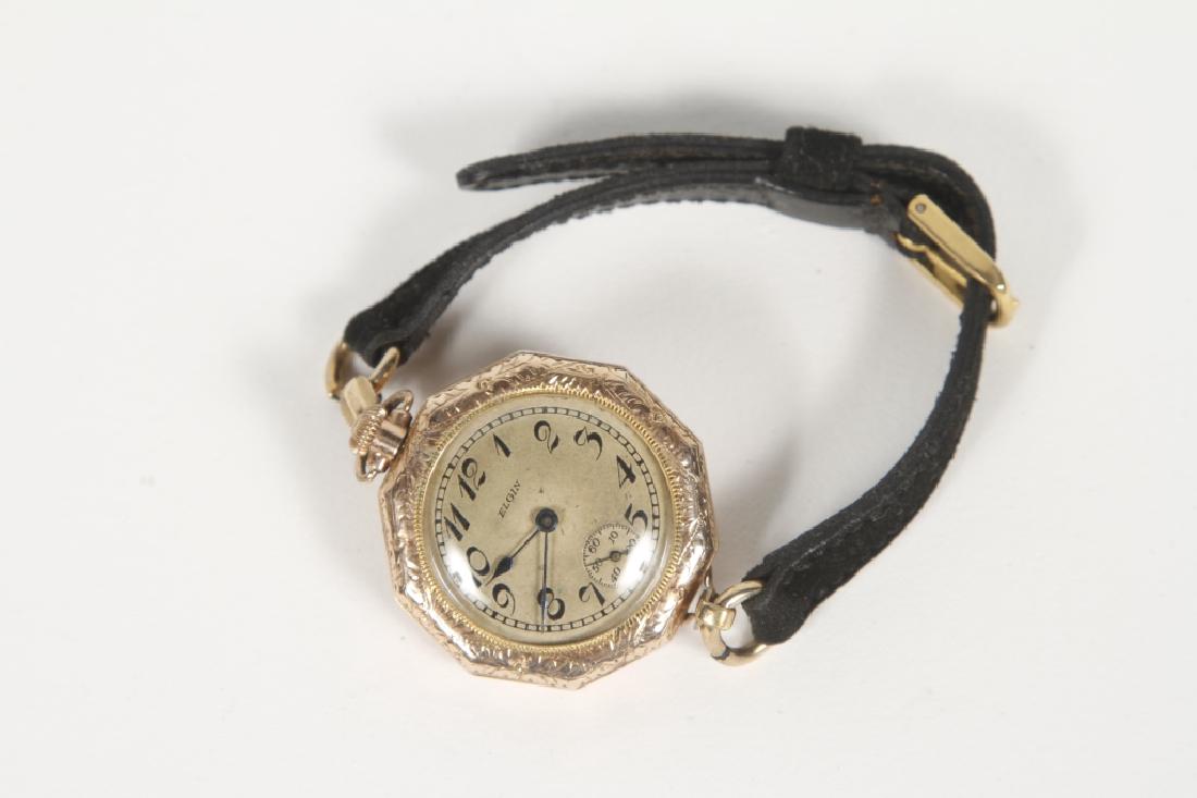 Ladies Gold Victorian Wrist Watch: Late 19th century. Having 10k gold cast with chased detail surrounding decagonal form. Good overall condition and watch is working in the gallery. Face: W1 1/2" Collection of a Louden, Tennessee Famil