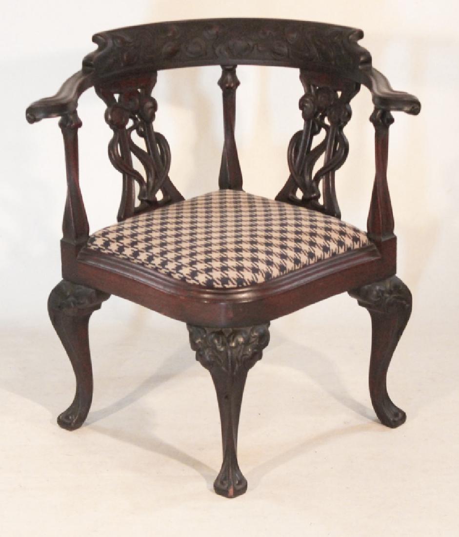 Quality Arts & Crafts Period Carved Walnut Corner: Late 19th/early 20th century. The chair having excellent carved detail in the art nouveau taste with very fine houndstooth upholstery. H30 1/4" W29 1/4" D25"