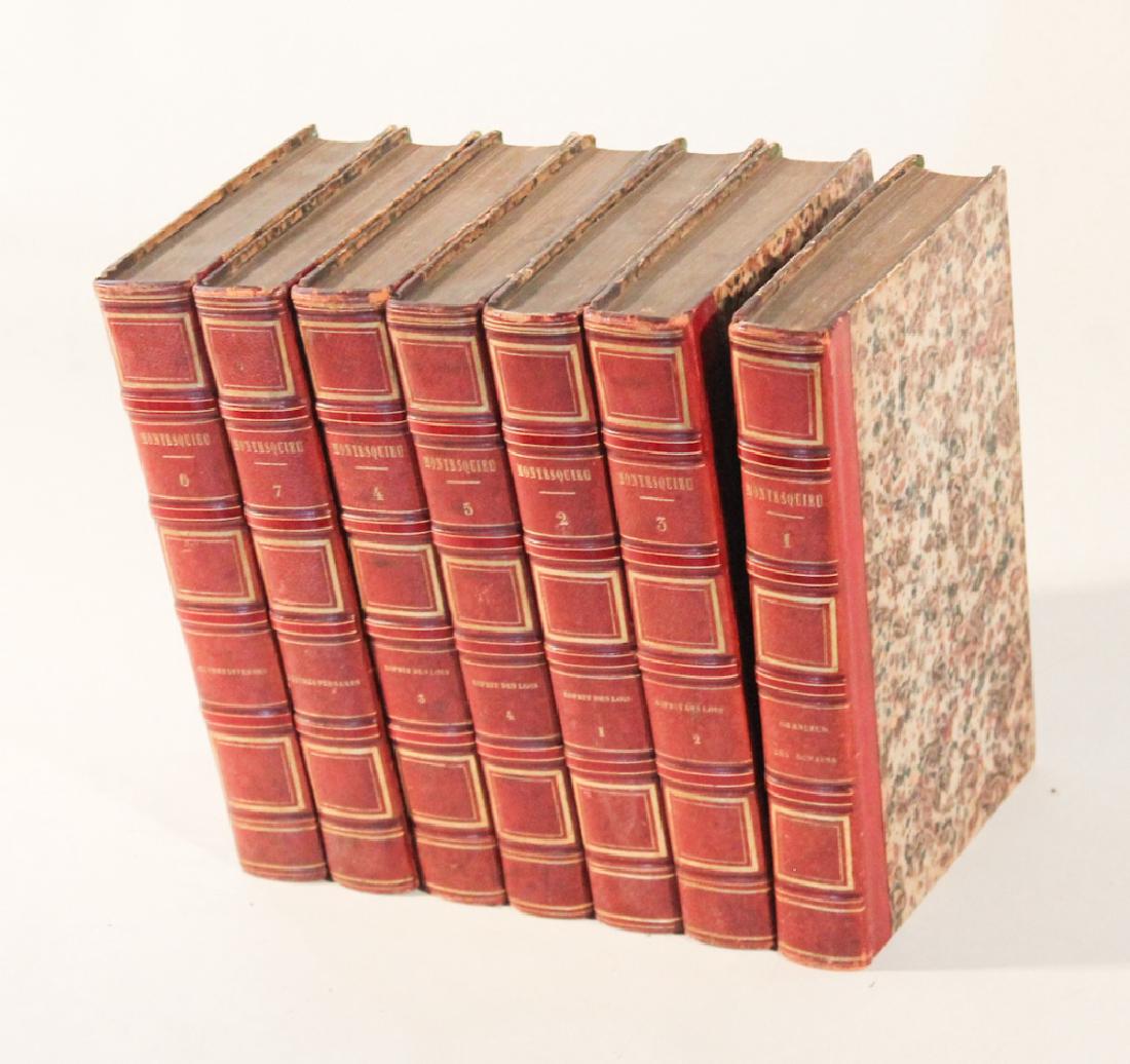 Seven Antique Leather Bound Volumes, Montesquieu: Montesquieu, Charles de Secondat, and Destutt de Tracy, Antoine Louis Claude. Oeuvres de Montesquieu. Paris, H. Feret, 19th century.Good condition overall with some wear to edges and discoloration wit