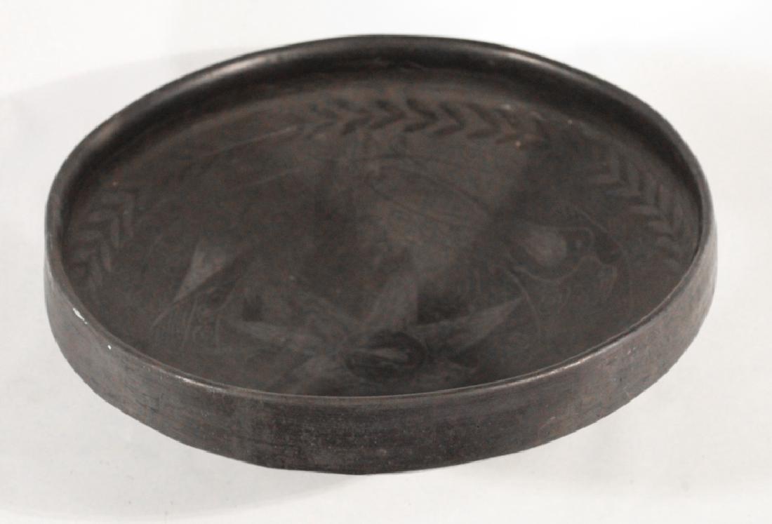 Antique Native American Pottery Bowl: Late 19th/early 20th century, likely Western United States. The bowl is profusely decorated at the interior with birds and fauna. The bottom bears an early possible artisan label. Some surface wear th