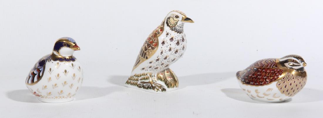 Three Royal Crown Derby Old Imari Porcelain Birds: Britain. The group includes a bone china Song Thrush, Red Legged Partridge and Dappled Quail. Excellent condition. Tallest: H4 1/2"