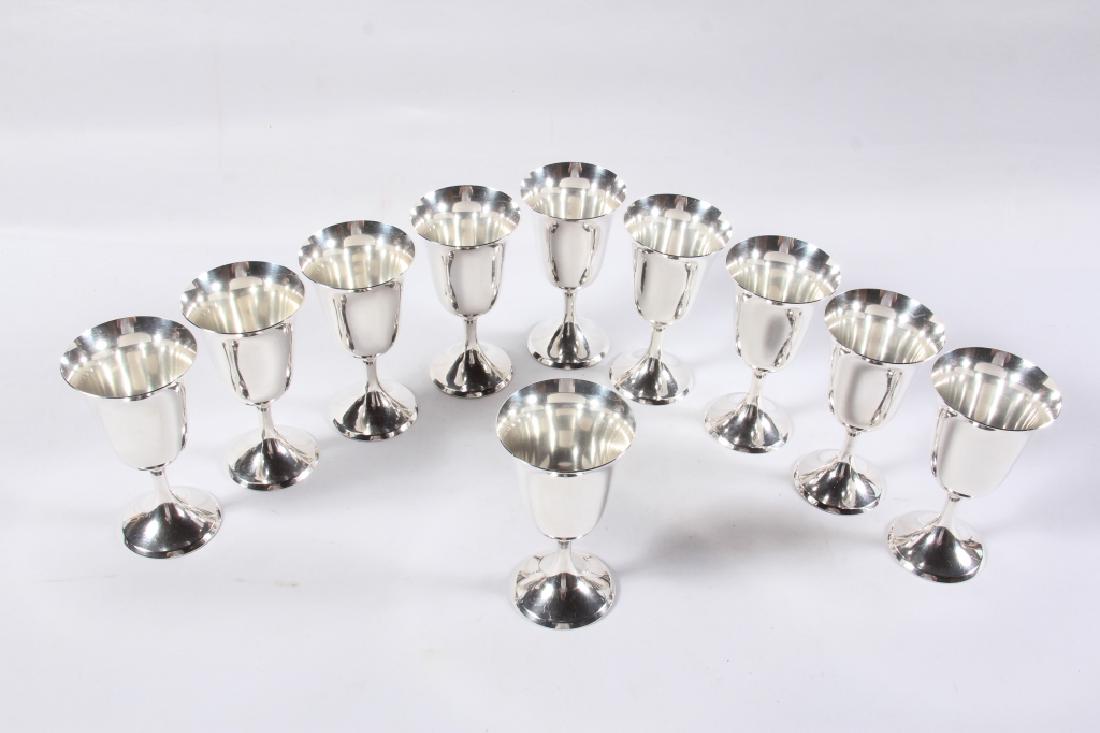 Set Steiff Sterling Silver Wine Cups: Set of ten goblets in good condition. No monogram. Only slight surface wear which is minimal. H6 5/8"