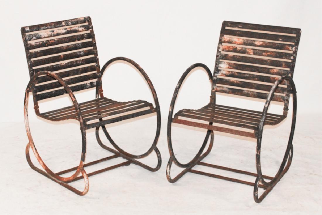 Pair Art Deco Mid Century Metal Easy Chairs: Circa 1950. Each conforming with metal throughout featuring circular side rails and slat back and seat. Some wear to surface but only surface rust. H33" W21 1/4" D22"