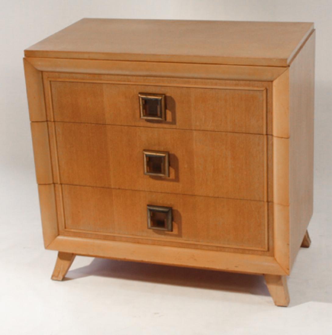 Art Deco Mid Century Birch Chest of Drawers: By J.L. Metz. The piece having a square case housing three conforming drawers centered by deco brass pulls at the center atop flared foot. Some slight loss to veneer near the top of drawers but overal