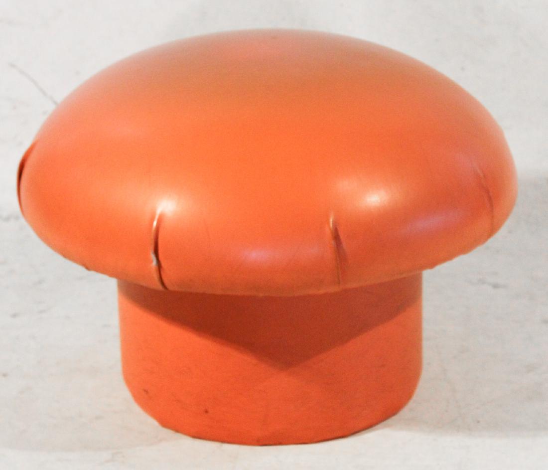 Mid Century Art Deco Mushroom Footstool: Mid 20th century. Very interesting piece having a circular top above cylindrical base. The top is stuffed nicely and the frame upholstered in what is likely the original orange vinyl. H18" W25" Sold f