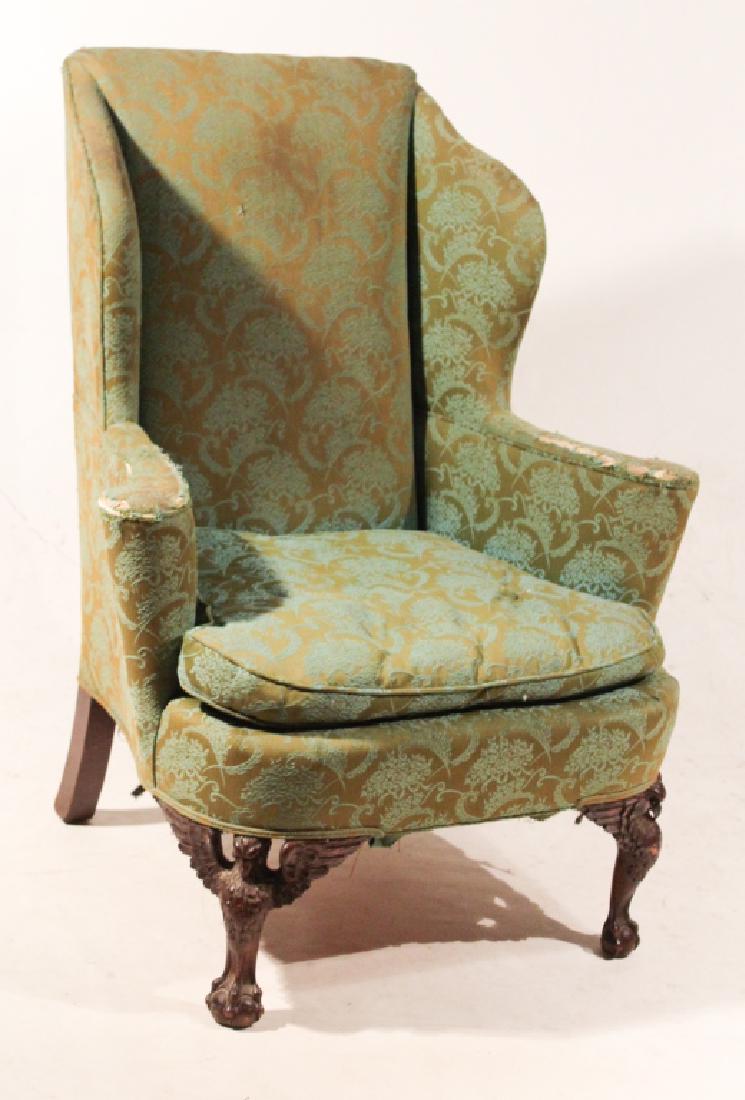 Chippendale Style Carved Mahogany Easy Chair: Circa 1890, colonial revival. Having a shaped and upholstered frame resting atop very nicely carved eagle front feet with wings atop ball and claw. H43 1/2" W36 1/2" D32" Sold from the collection of a