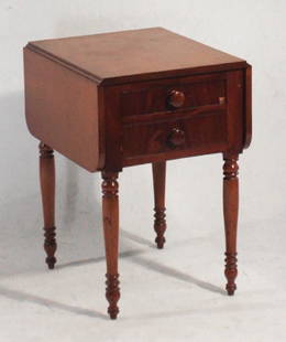 Sheraton Cherry Drop Leaf Side or Work Table: Circa 1820, America. Having two drop leaves centered by two drawers above nicely turned tapering legs. H26 3/8" W17 3/4" D20 3/4"