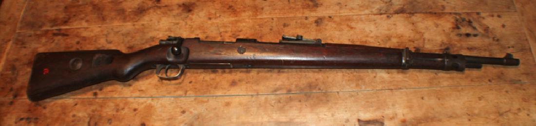 German World War Two Third Reich M-98 Mauser Rifle: Having Nazi seals along side serial number 3118. The stock is also marked 3118 as well near the but. L43 1/4" Sold from the collection of a private Aiken South Carolina family. Note: FFL Background ch