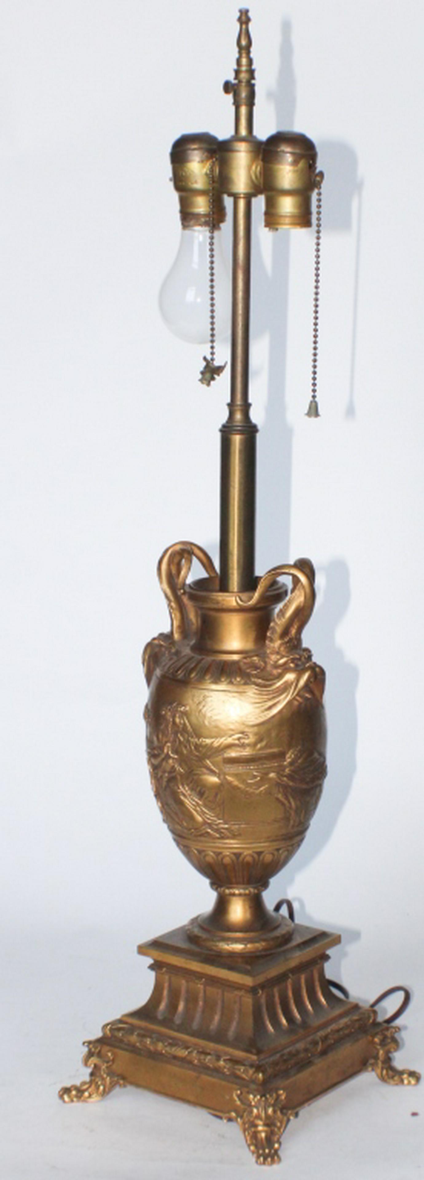 Ferdinand Barbedienne: (France, 1810-1892) Nepolionic bronze urn atop stand. Exceptionally sculpted with great detail and form. The piece was likely an oil lamp prior to being electrified. Nice patina throughout and in good