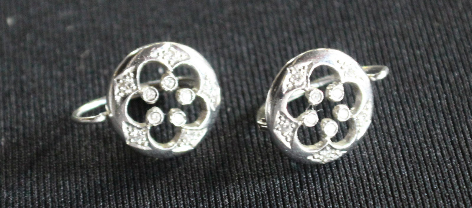Cathy Waterman Platinum & Diamond Earrings: Platinum circular earrings with ten diamonds each inset amounting to aprox .20 ct. Very good condition marked on verso with makers mark. .1 oz total