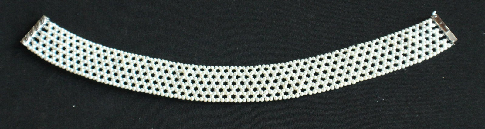 Edwardian Seed Pearl & 14k Gold Choker Necklace: Early to mid 20th century. Having been comprised of many small pearls and the claps marked 14k in white gold. Very good condition. L13 1/2" Sold from the private collection of a Southern lady and gent