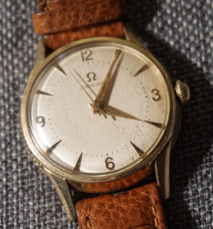 Vintage Mens Omega Automatic Wristwatch: Gold fill case with stainless back. The watch is in good working order. Well cared for example. All jewelry lots in this sale have been professionally examined by a jeweler and authenticated.