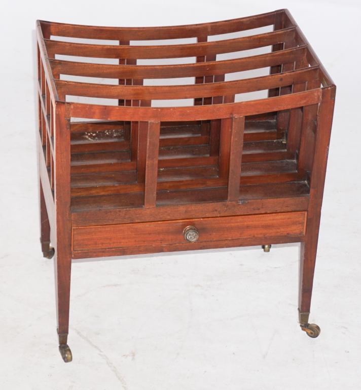 George III Canterbury Music or Magazine Stand: Circa 1800, Britain. Mahogany, having four divided segments with single drawer and brass pull above tapered legs terminating in square cup casters. H20" W18 1/4" D13" Sold from the collection of Mrs. 
