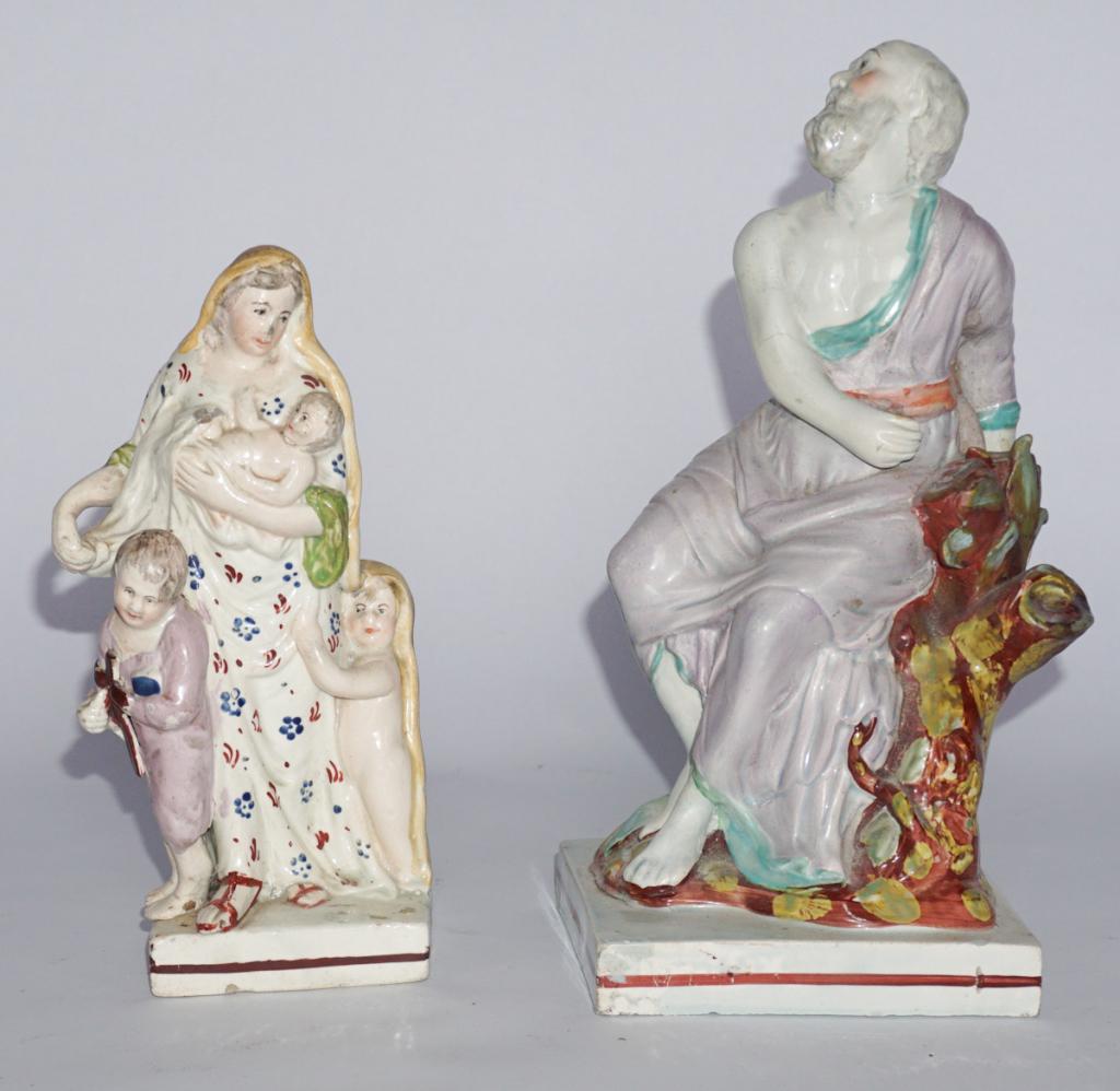 Two Early Creamware Staffordshire Pottery Pieces: Early 19th century. Each nicely formed of greek figures. The figure of the man having a hairline at mid body missing a thumb and having several areas of inpainting. The figure of the female with child