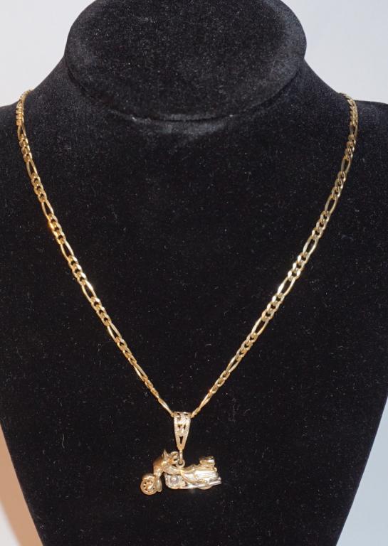 14k Gold Motorcycle Pendant on 14k Gold Chain: The piece is nicely formed as a cruiser and the wheels roll when touched. 20 grams total. All jewelry lots in the auction have been professionally examined by a jeweler and authenticated.