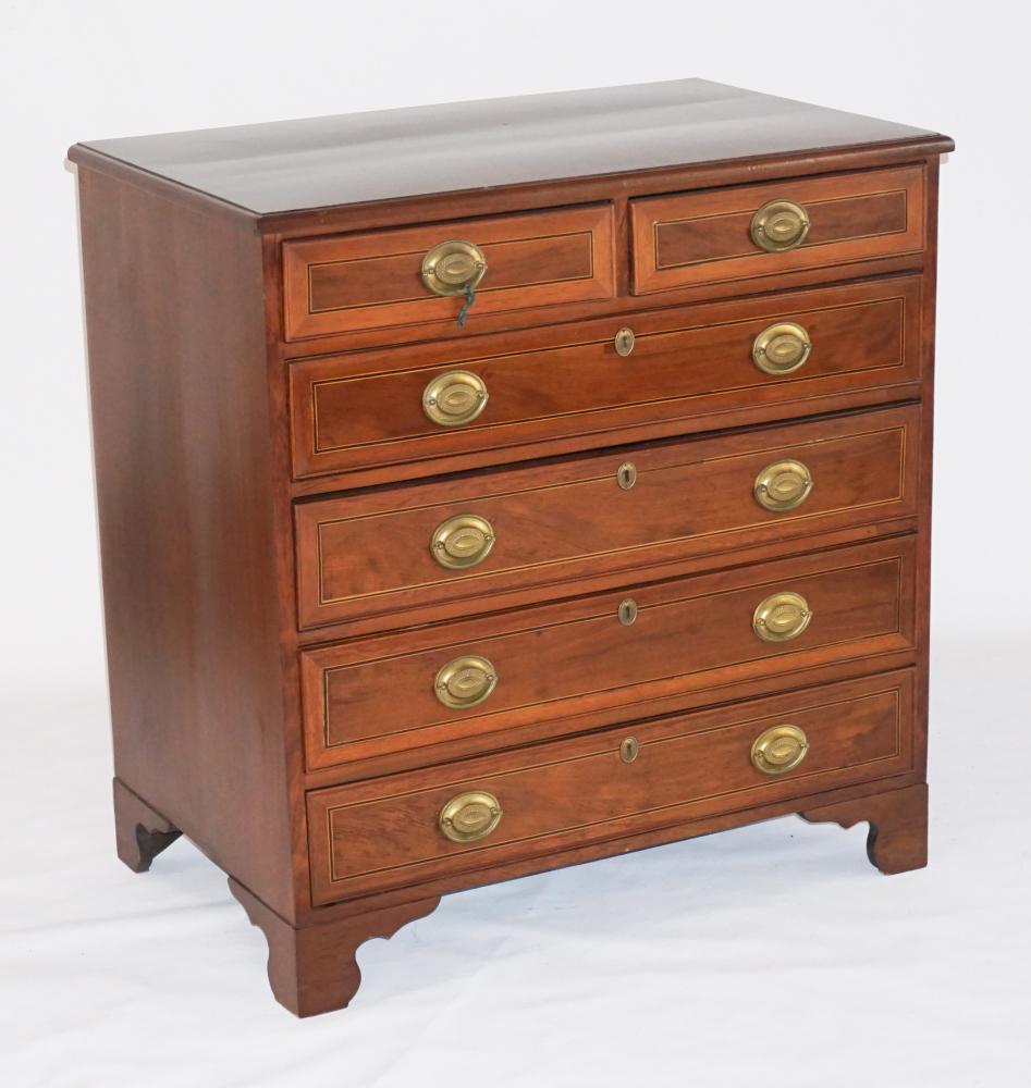 British George III Inlaid Mahogany Chest: Circa 1820. Having a molded edge atop nicely inlaid drawers with a two over four drawer configuration, all resting atop bracket feet. H39" W37 1/2" D23 3/8" Sold from the collection of an Athens, Geor