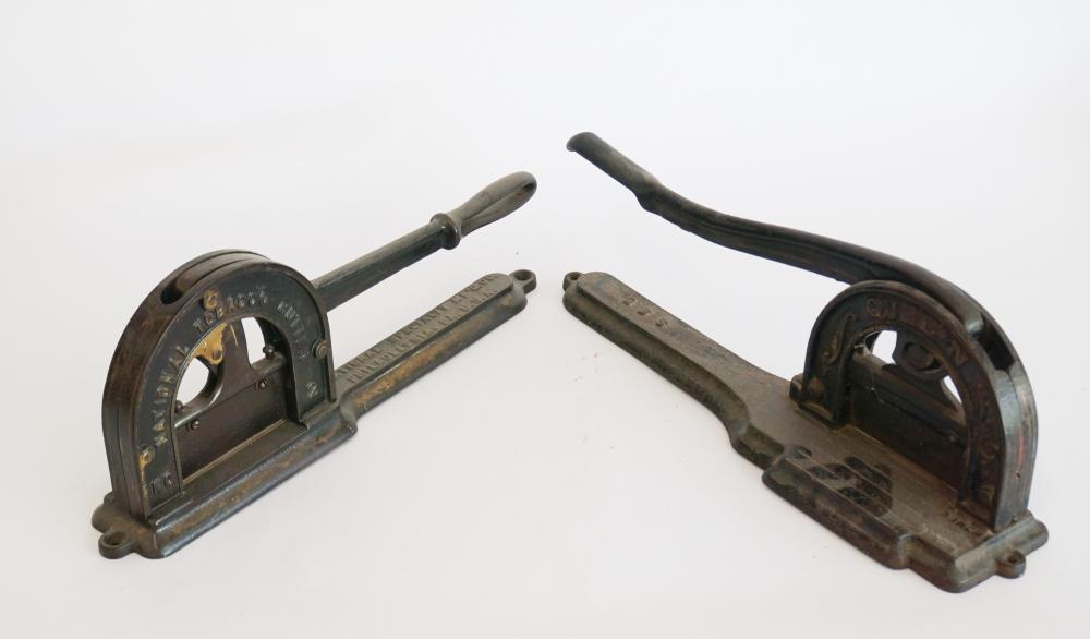 Two Antique CI Advertising Tobacco Plug Cutters: Each having matching relief decoration, one marked Superior and one marked Superb. L18 1/2" Sold from the collection of a Greenville, South Carolina couple.