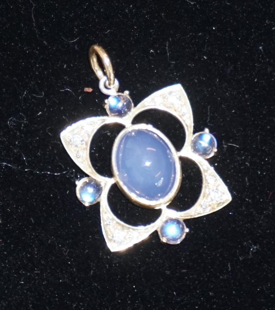 18k Gold, White Sapphire, Moon Stone Pendant: for Fishers of California. Custom having 1/4 ctw of round cut White Sapphires surrounding moonstone cabochon inset into custom pendant. Marked KBR likely for Kent Baagoe Rystrand / Danish H1 3/8" 7 gr