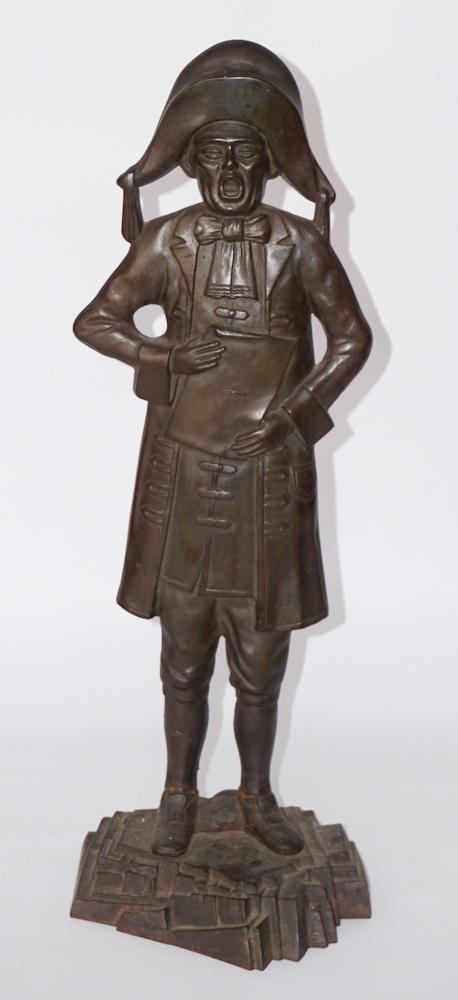 Interesting English Iron Doorstop of Town Cryer: 19th century. Marked at verso with production number and ÒMADE IN ENGLANDÓ. Very nice patina throughout. H21 5/8" Sold from the collection of a Florida/South Carolina Gentleman.