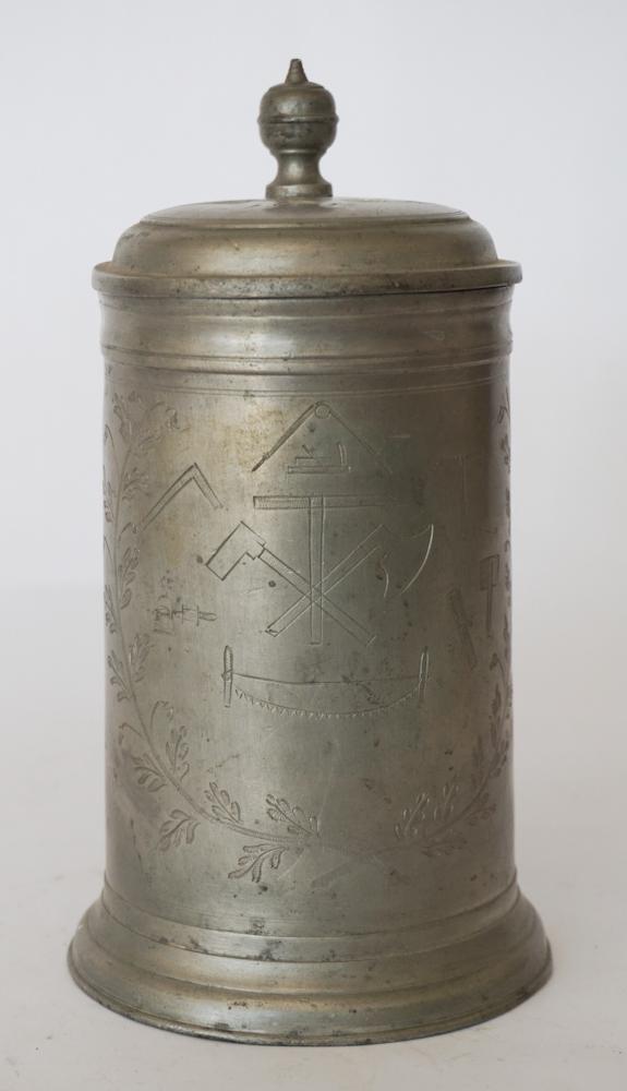 Handsome Masonic Antique Pewter Tankard: Mid 19th century, American or British origin. The piece is handsomely chased with the name William Speech and date 1861 at the lid and the body chased with Mason symbols. The handle is marked with a t