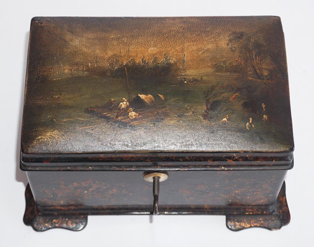 Handsome English Chinoiserie Decorated Tea Caddy: Circa 1850. The piece has a wonderfully painted top featuring men on a river barge going down stream in the moonlight. The piece has a mother of pearl escutcheon plate with a nicely gilded body atop s