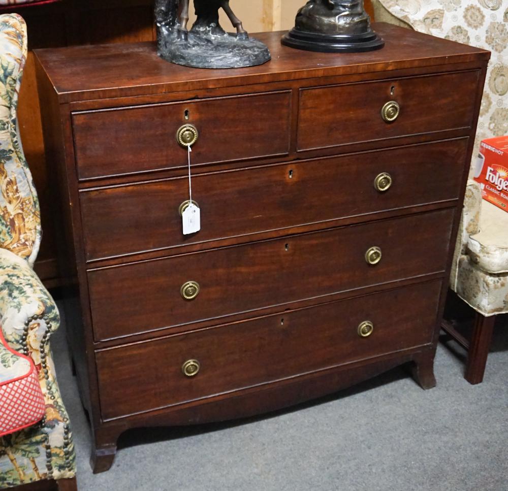 British George III Mahogany Chest of Drawers: Circa 1810. Having a rectangular top above two over three drawer case having fine figuring to case and drawers all resting atop an elegant French foot. H40 3/8" D18 3/4" W41 1/4" Sold from the collect