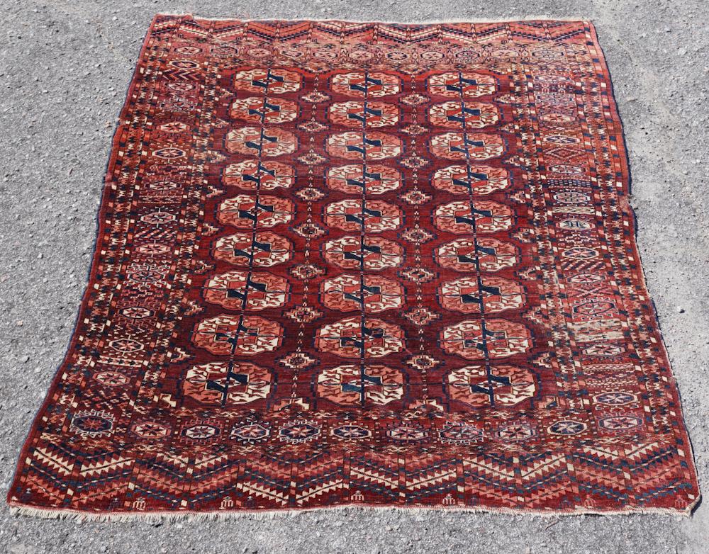 Antique Persian Turkoman Carpet: Early 20th century. Having a very fine and tight weave with good bold colors throughout. The fabric is very soft to the touch. L68 1/8" W49 5/8" Sold from the collection of a Marietta, Georgia lady.