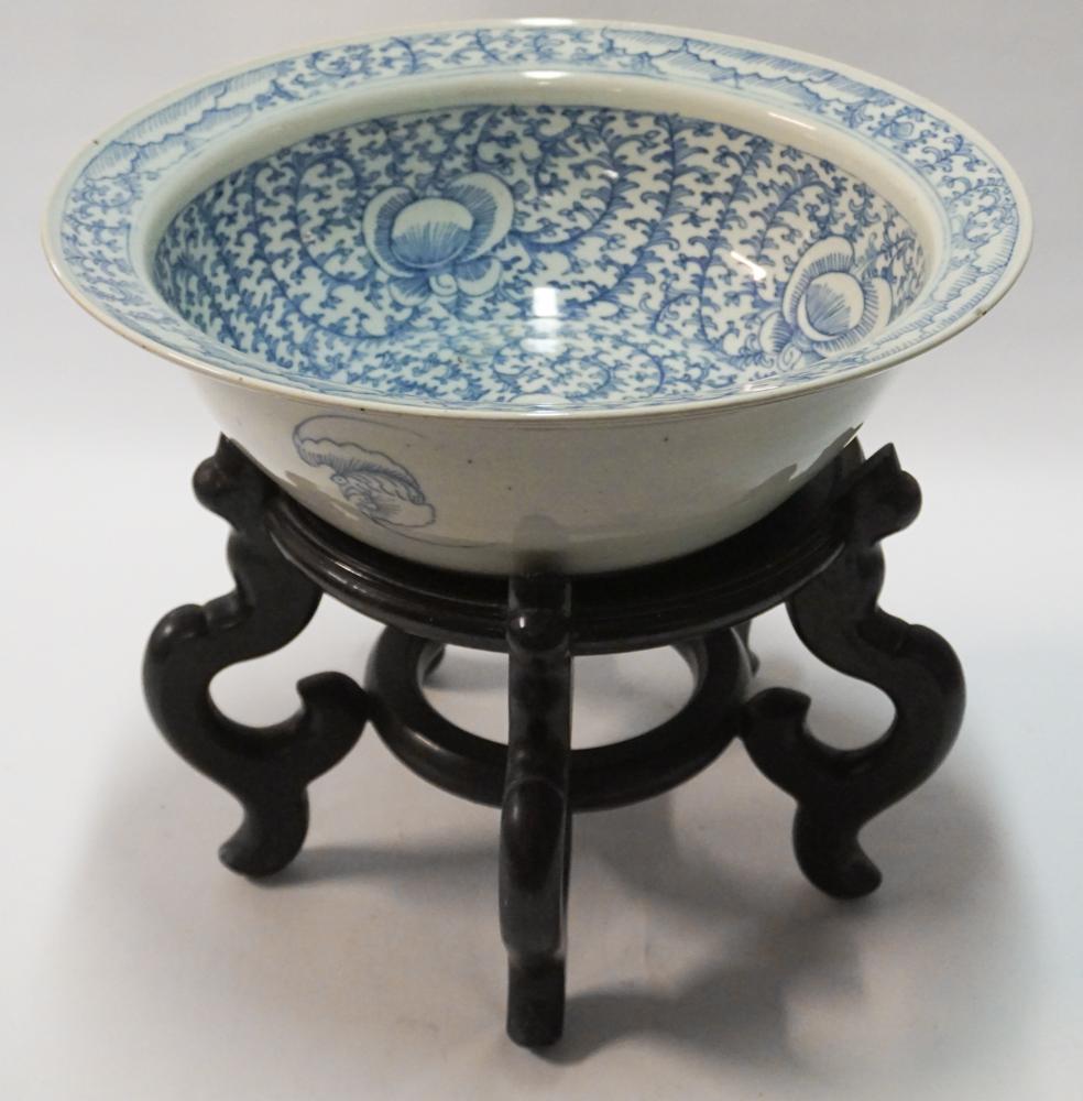 Antique Chinese Canton Blue & White Center Bowl: 19th century. Porcelain bowl having a larger size with nicely decorated body atop wooden stand. Good overall condition other than a tight hairline at bottom side. H5 1/4" W16 1/4"