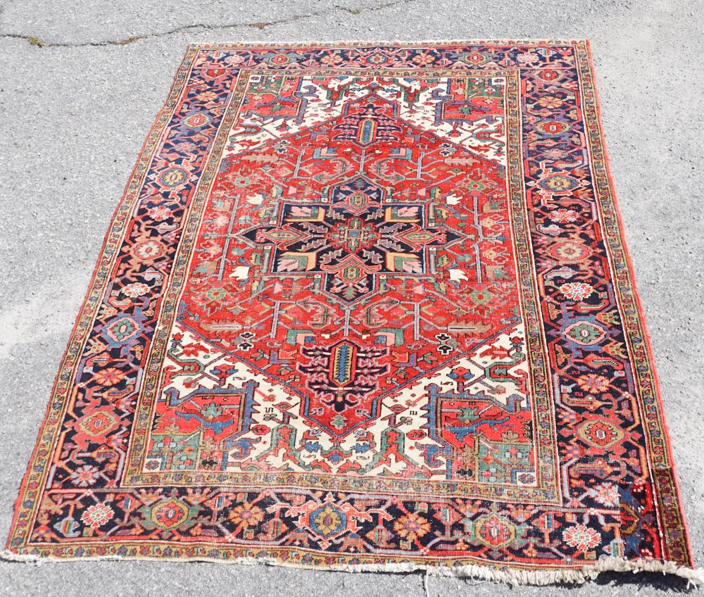 Antique Persian Heriz Carpet: Early to mid 20th century. Having bold and handsome patterns and colors throughout. L112" W78" Sold from the collection of a private Charleston, South Carolina lady.