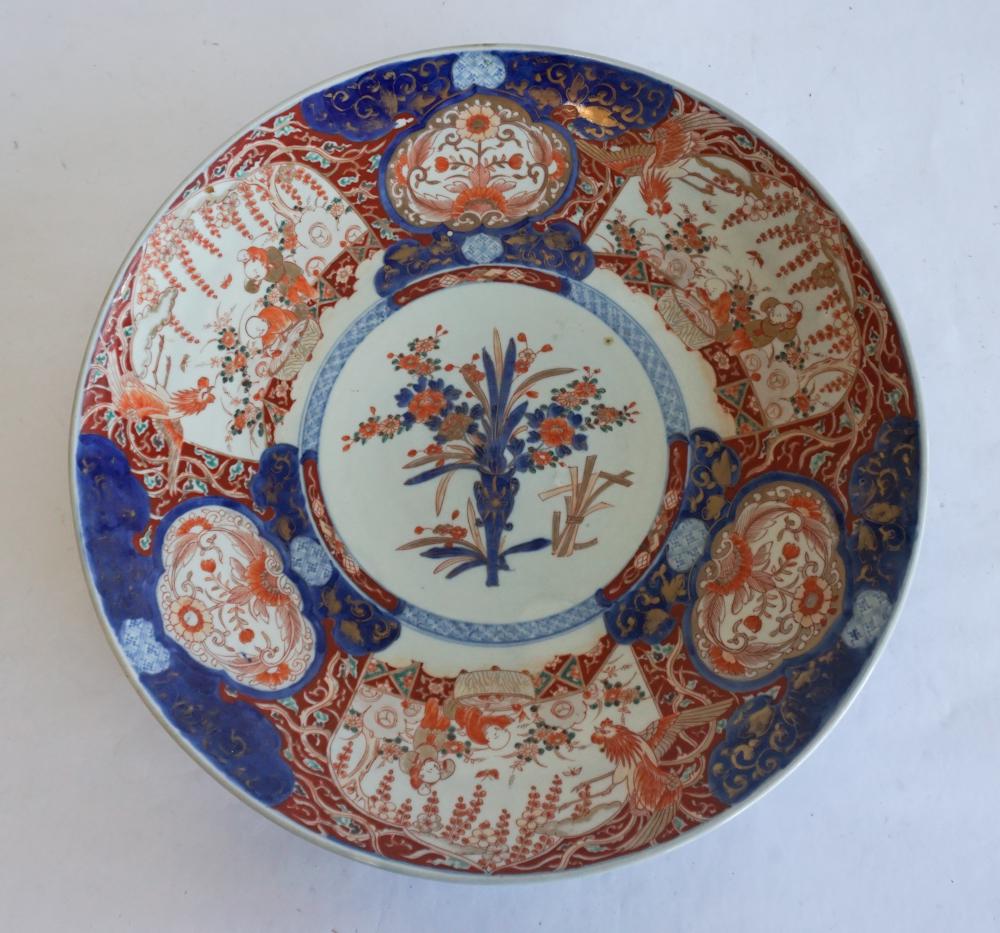 Antique Japanese Imari Porcelain Charger: Circa 1880. Having a very well decorated body with bold colors and white ground porcelain. Good condition throughout. W18 1/2"
