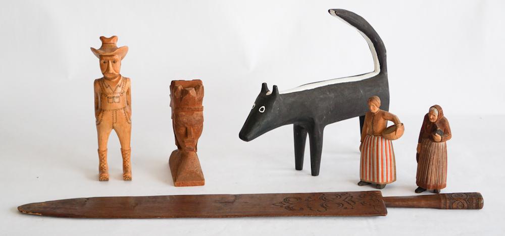 Collection Vintage Folk Carvings: The group includes six various carvings. One skunk signed CBK, a carving of a woman with label of D. Ralph Milard of Asheville, North Carolina, a cowboy signed BD on the foot, an unsigned woman with b