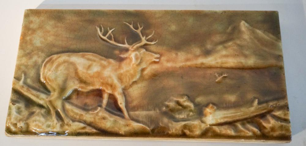 Quality Antique Arts & Crafts Glazed Mantle Tile: Early 20th century. Glazed and molded tile of a larger size with elk walking in hill country. Good condition. W12 1/4" H6" Sold from the personal collection of the late Mr. Joe A Bailey Sr. of Lancast