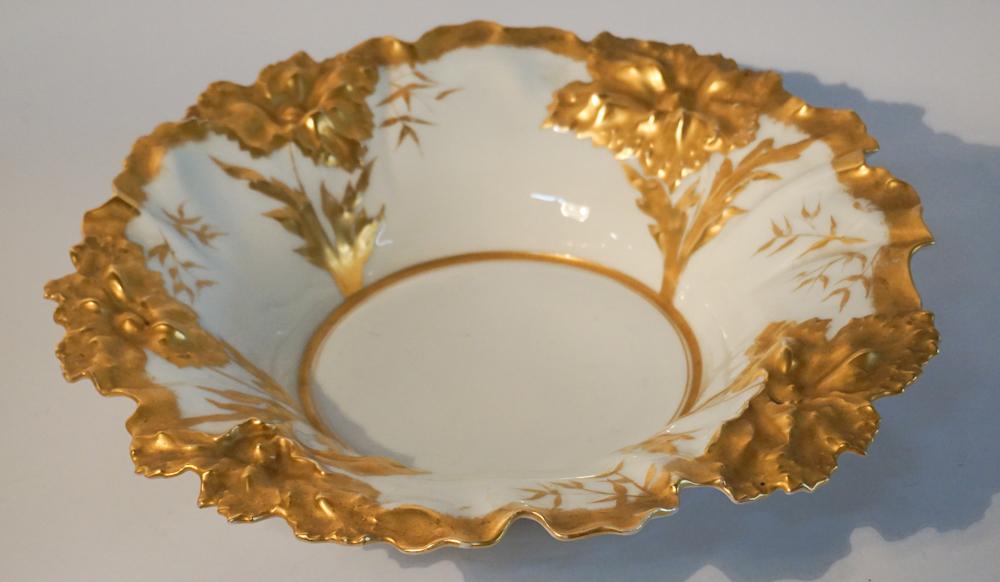 Renaissance Revival Gilt Porcelain Center Bowl: Reinhold Schlegelmilch, Germany. (1870-1880). Very nice and elegantly gilded bowl with white glazed ground. Marked on verso. W15 3/8" H3 1/2" Sold from the collection of the French family of Columbus,