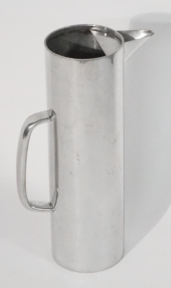Danish Modern Polished Pewter Drinks Pitcher: by Gerald Benney. Mid 20th century having a fine form and well polished body. Very good, well cared for condition throughout. H10" Sold from the collection of a San Francisco /Upcountry, South Carolin