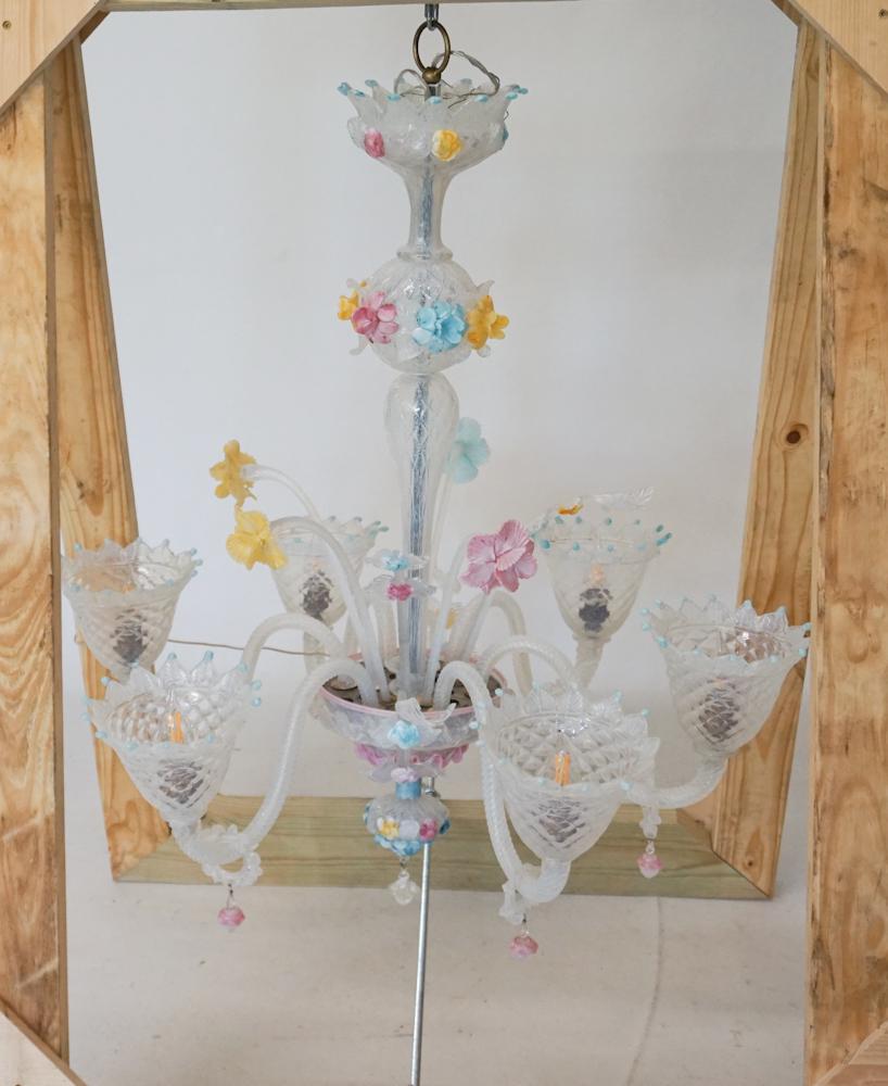 Very Fine Italian Blown Murano Glass Chandelier: Early 20th century. The piece has colorful blown glass arms and accents throughout with floral stems rising at the center. The piece is six light configuration. H40" W34" Sold from the collection of a