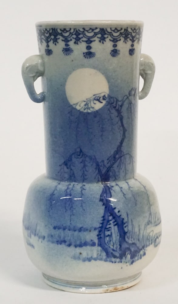Antique Japanese Meiji Pottery Porcelain Vase: 19th century. Having elephant head handles and blue and white decorated body with makers characters at the underside. No cracks or restorations. Underside having some very small hairlines consistent w