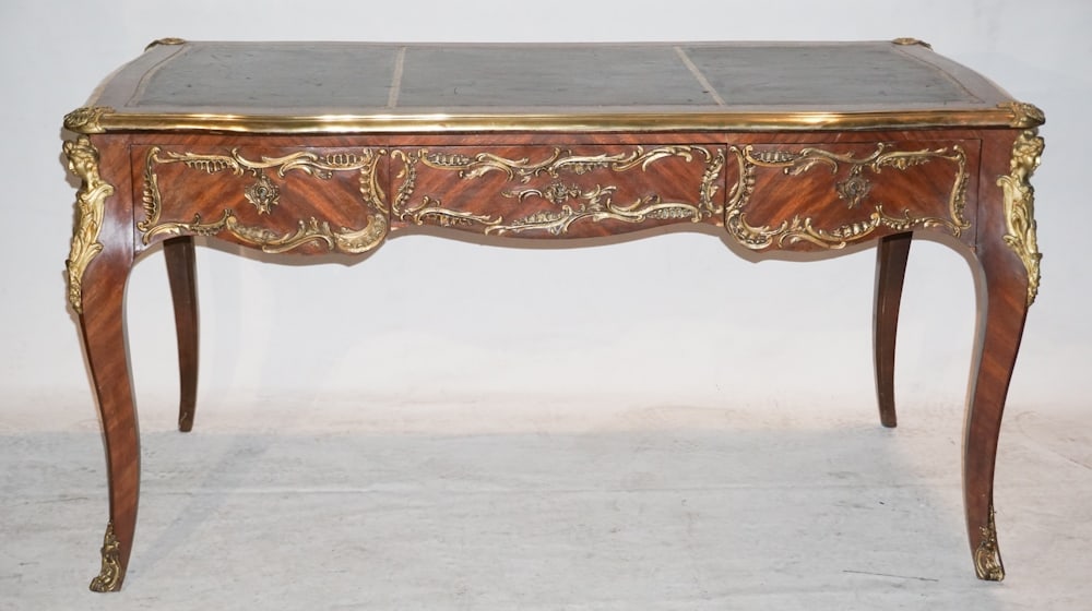 Handsome French Louis XV Style Kingwood Desk: 19th or early 20th century. Having a quality leather top and excellent grain to the case one side housing three drawers and the other having faux drawers with faux key holes the case having been mount