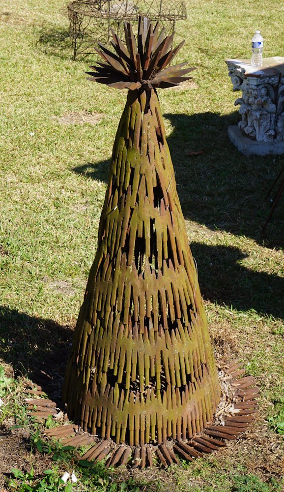 Excellent Mid Century Deco Iron Garden Sculpture: Likely French, manner of Tony Duquette. The piece having been crafted with excellent detail and style with a spike orb at the top over cone body crafted of the same iron spikes. Nice surface throughou