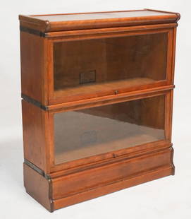 Antique Arts & Crafts Period Bookcase: By the Globe Wernicke Company of Cincinnati, Ohio. The stackable bookcase has two glass doors that slide into top. Nice well kept condition. H38 3/4" W34 1/2" D11 1/2" Sold from the collection of a Ch