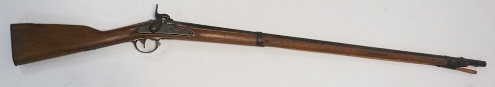 1851 Harpers Ferry Percussion Rifle: US Market with federal seal and eagle at the plate. The rifles having a nice patina throughout and all original elements. Nice well kept condition throughout. L57 1/2" Sold from the collection of a Ca