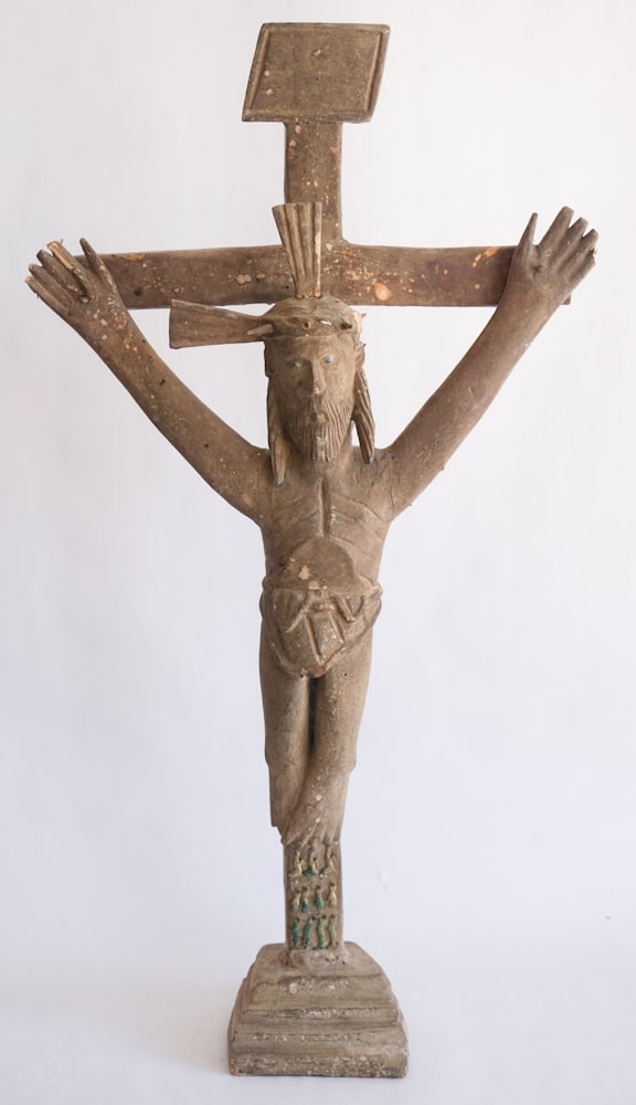 Antique Carved Wood Crucifix: 19th century, likely Spanish origin. Very charmingly carved example with a nice early surface. The piece looks to have glass or enamel eyes. Some slight losses and repair but overall nice presentable 